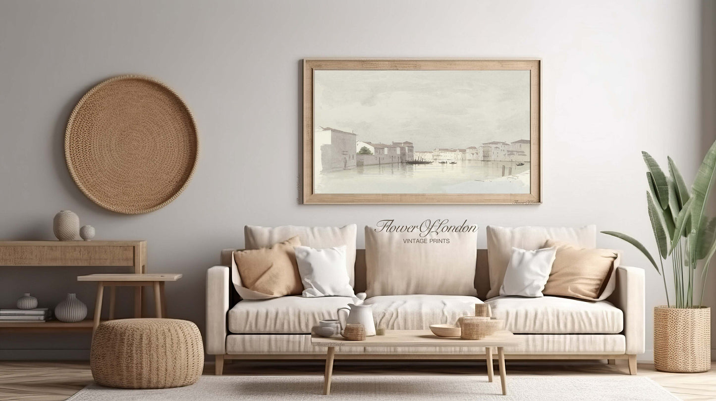 a living room filled with furniture and a painting on the wall