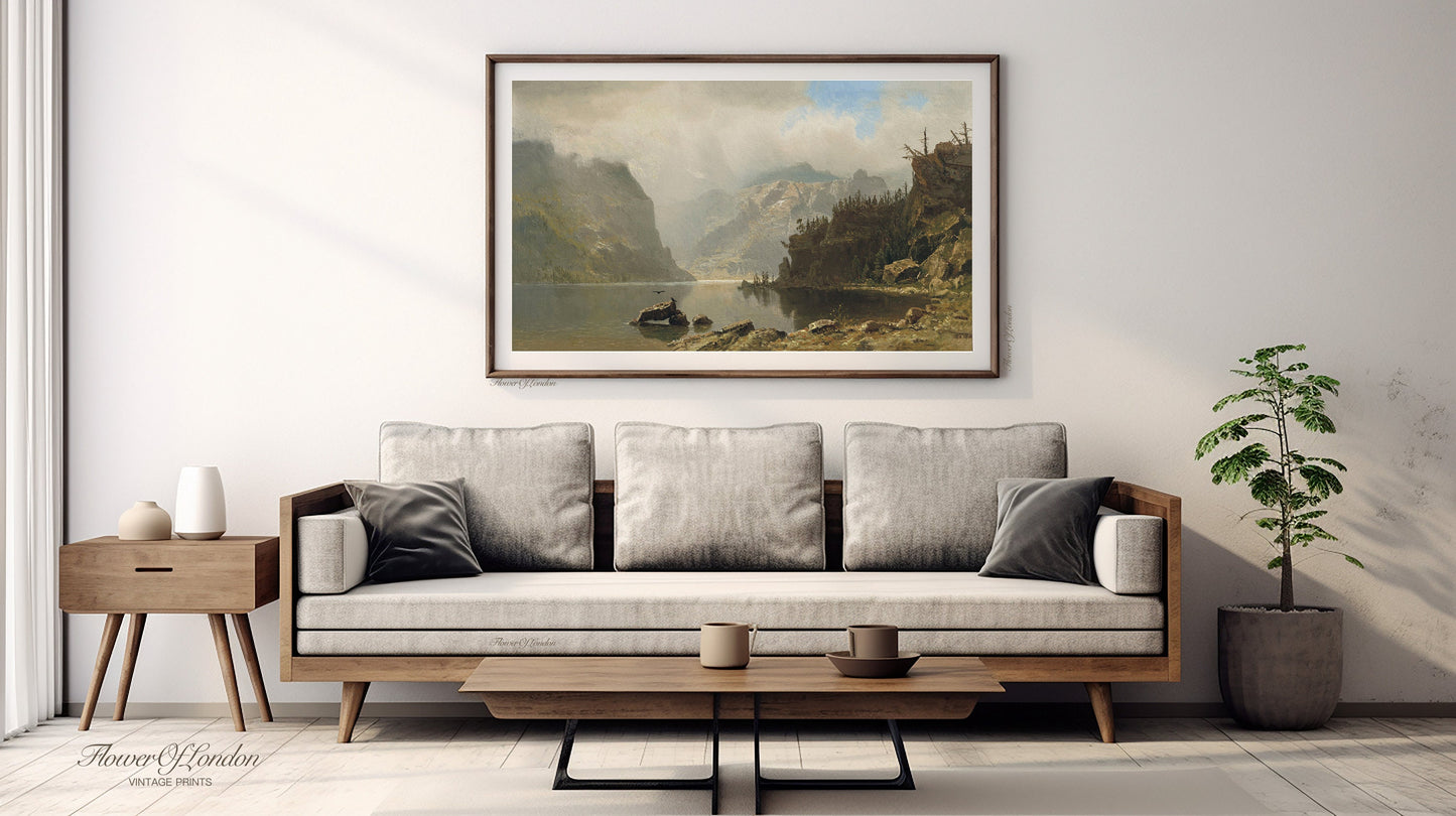a living room with a couch and a painting on the wall