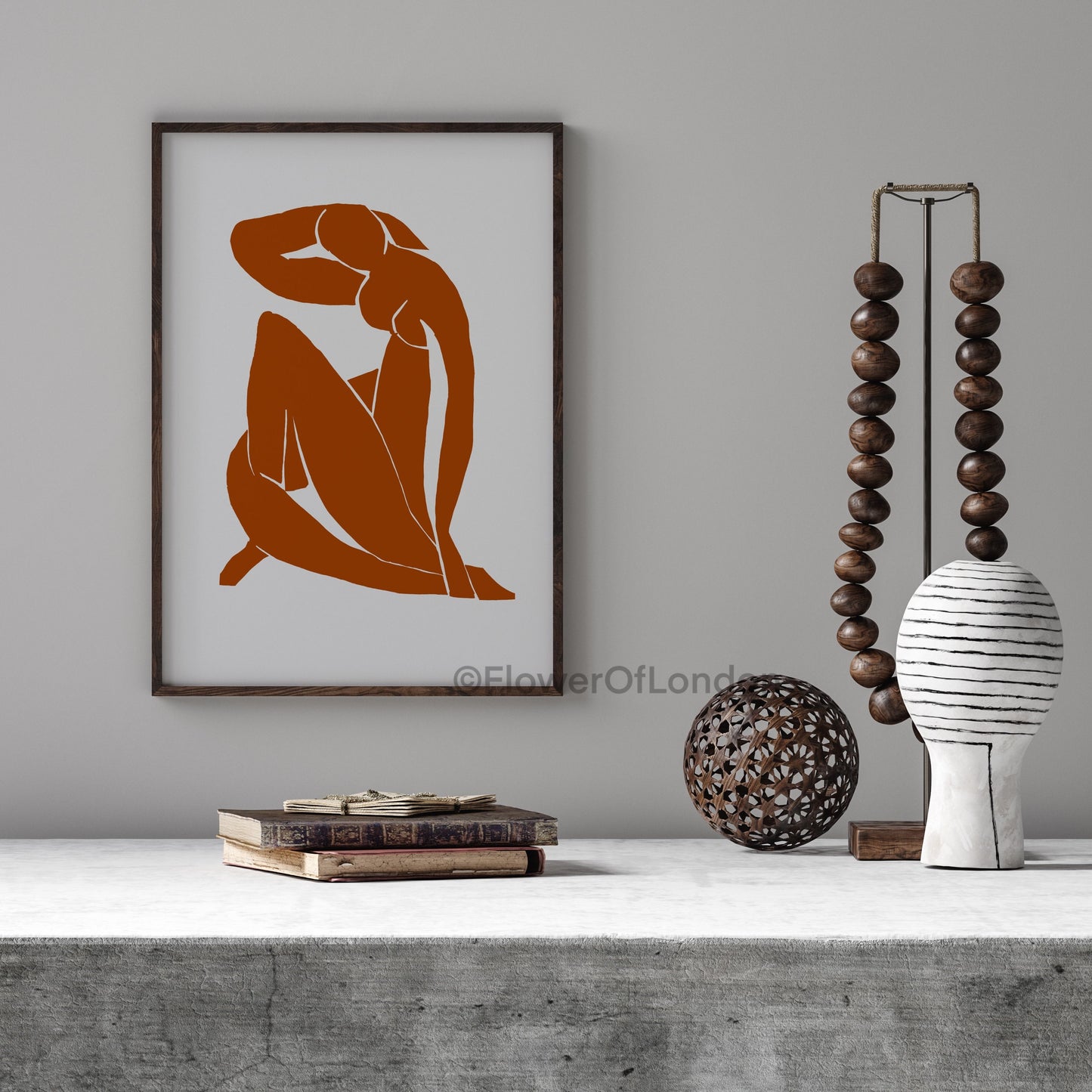 Matisse Blue Nude II art print in a neutral hallway with warm-toned accents