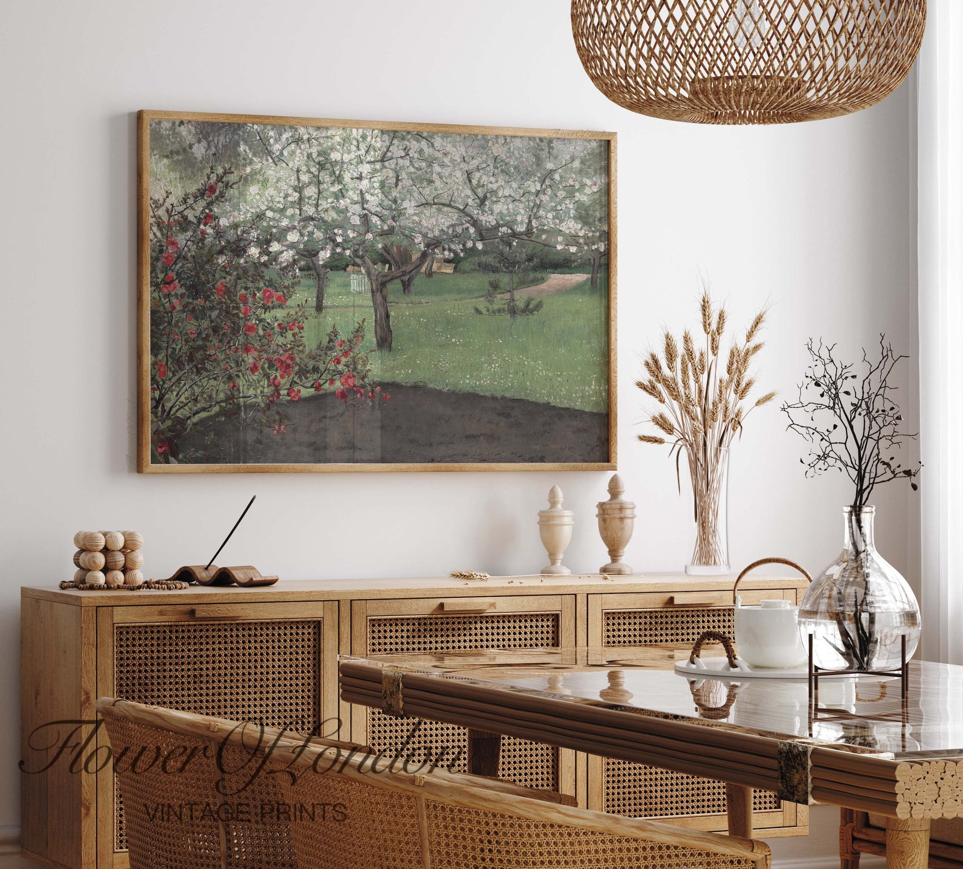 a painting hanging on the wall of a dining room