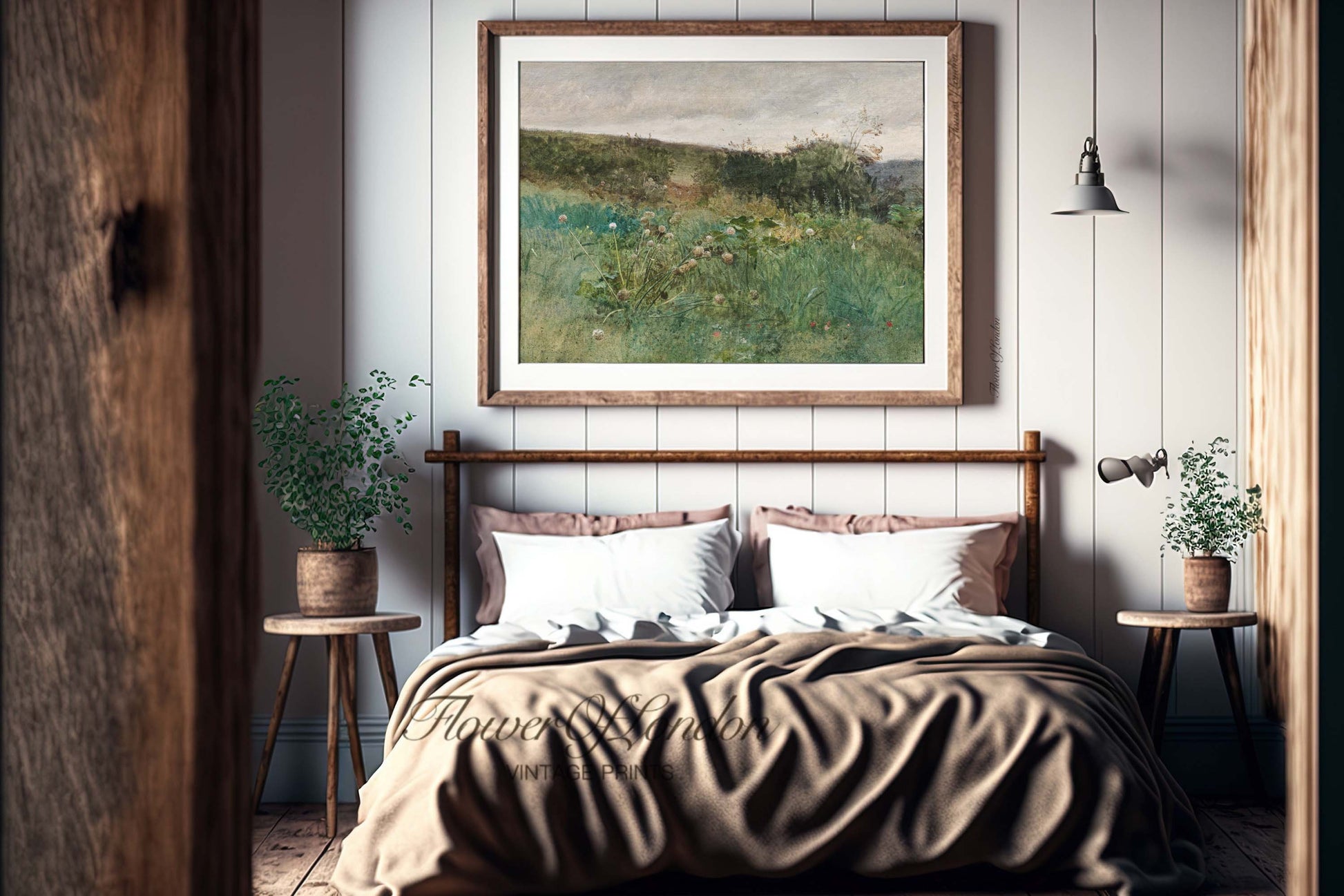 a bedroom with a picture hanging above the bed