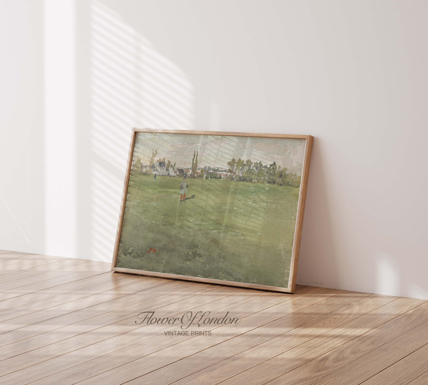 a picture frame sitting on top of a hard wood floor