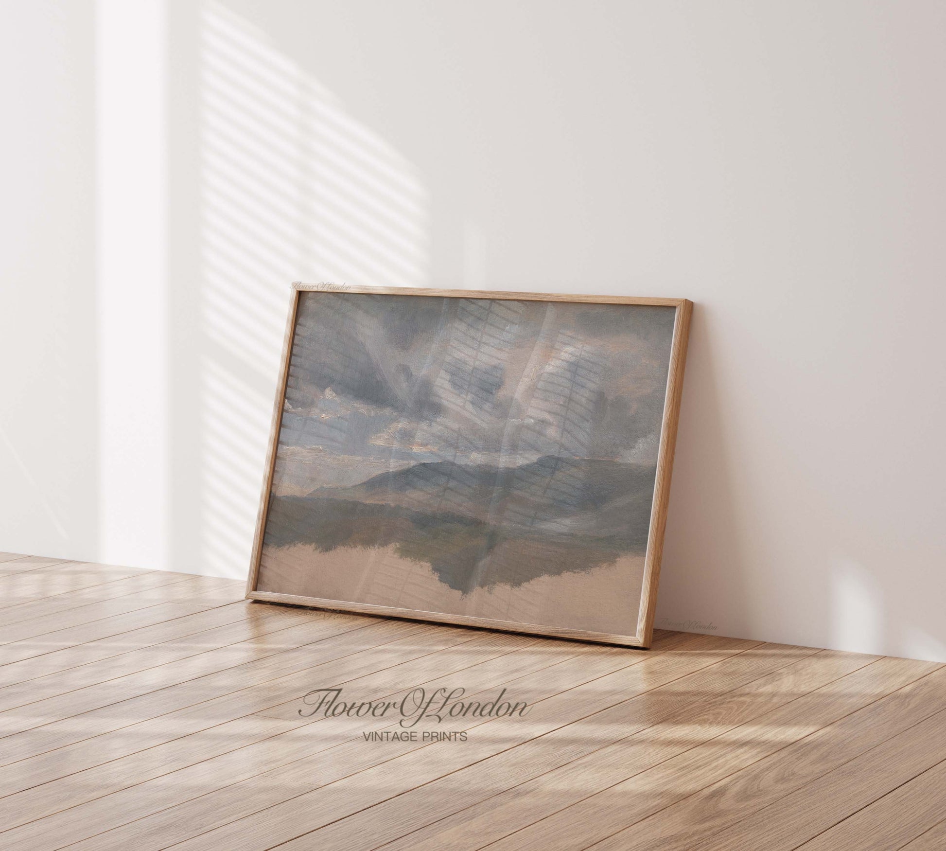 a picture frame sitting on top of a hard wood floor