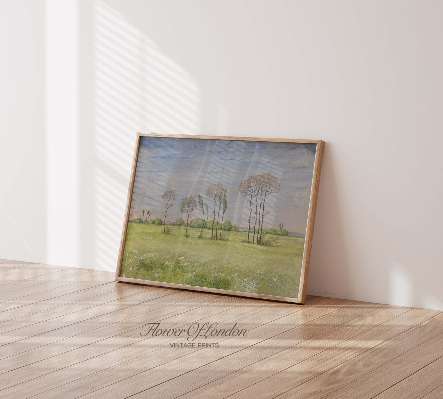 a picture frame sitting on top of a hard wood floor