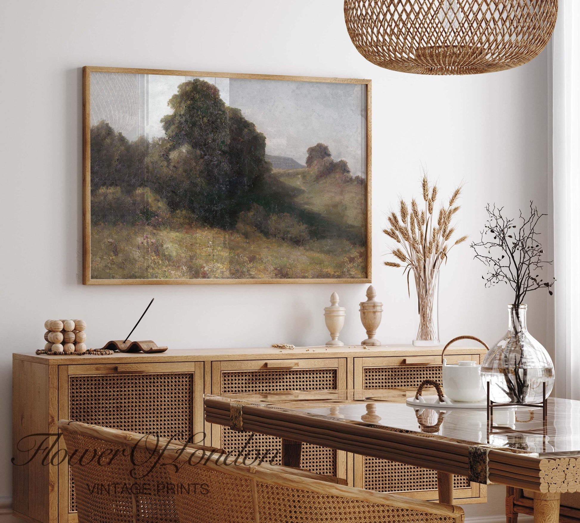 a painting hanging on the wall of a dining room