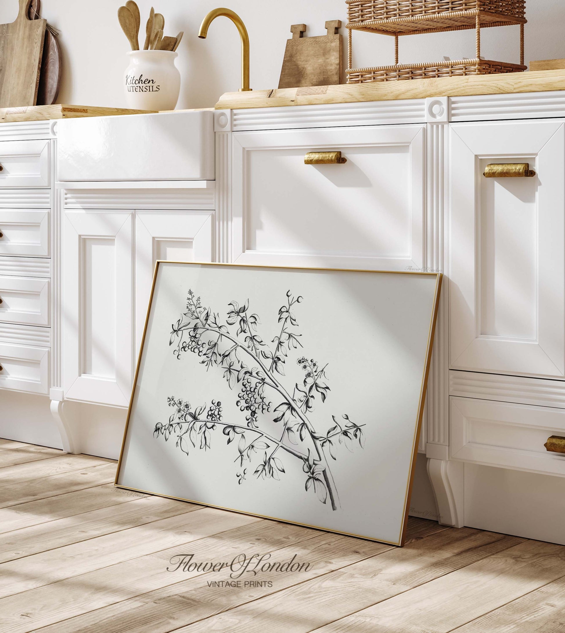 a picture frame sitting on the floor in a kitchen