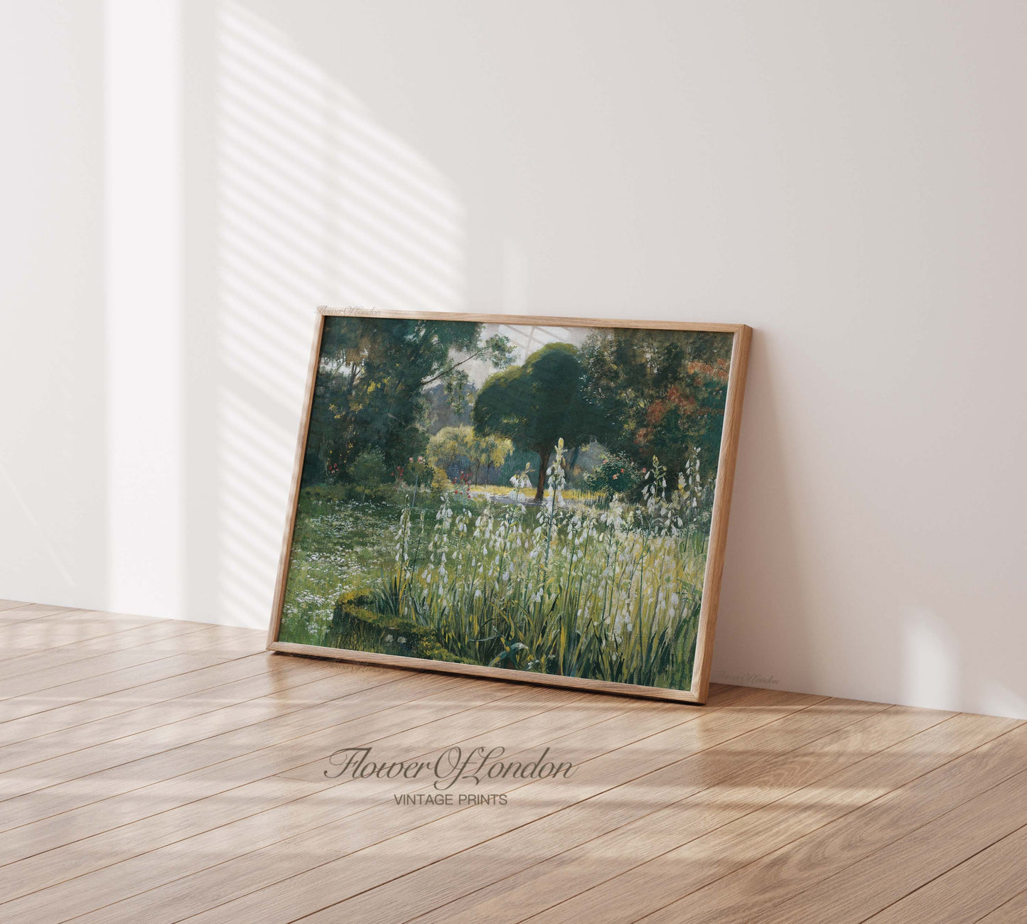 a picture frame sitting on the floor in front of a wall