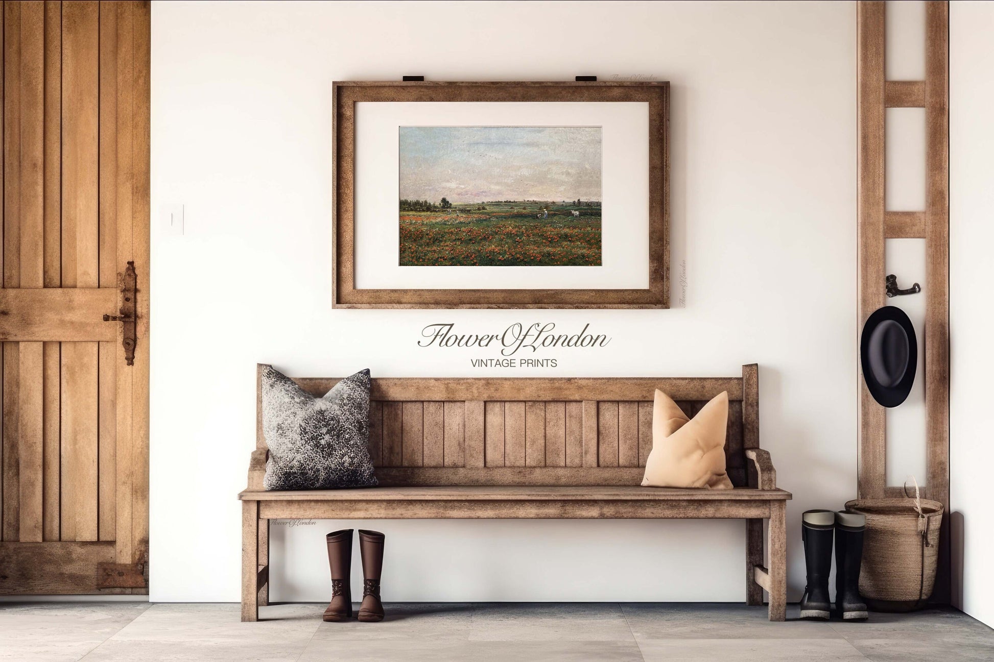 a wooden bench sitting under a framed picture