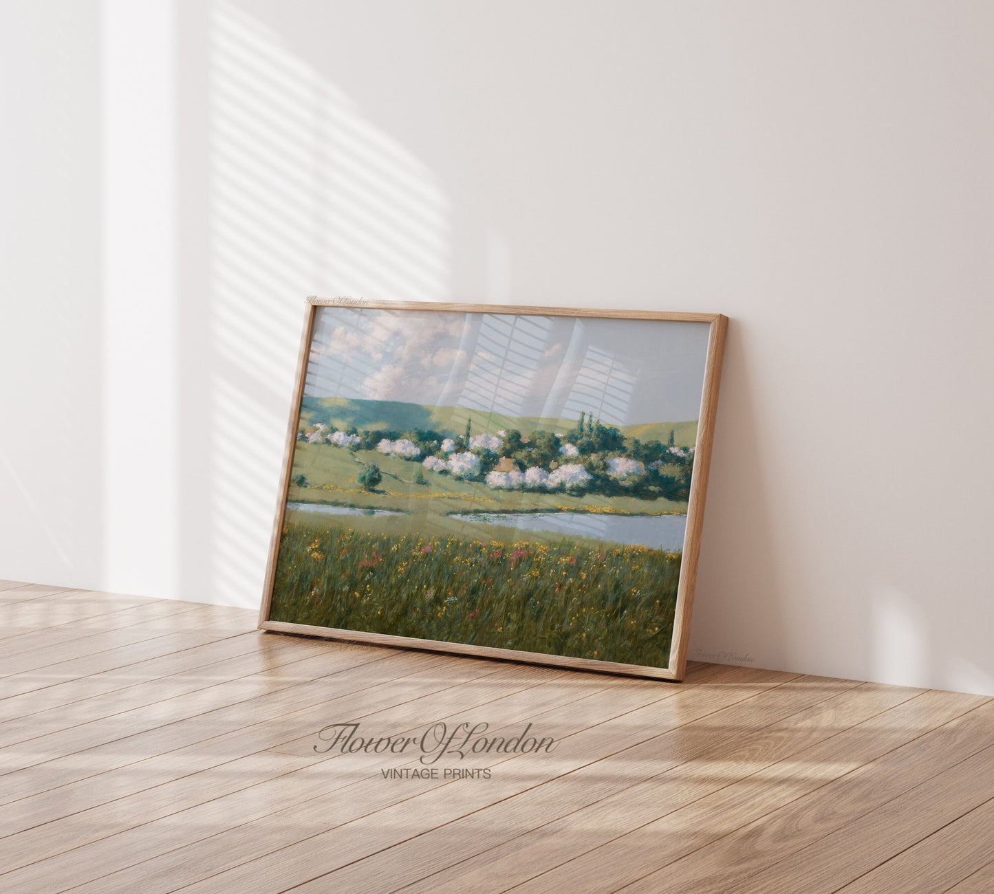 a picture frame sitting on top of a hard wood floor