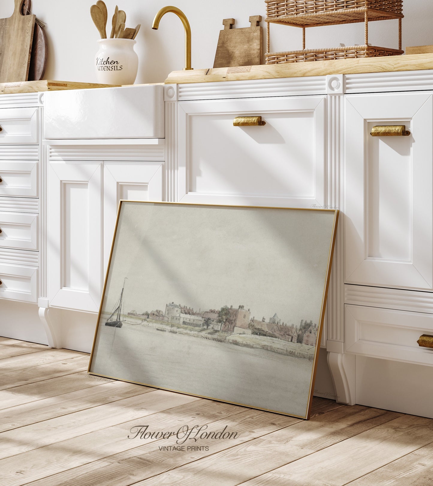 a picture frame sitting on the floor in a kitchen