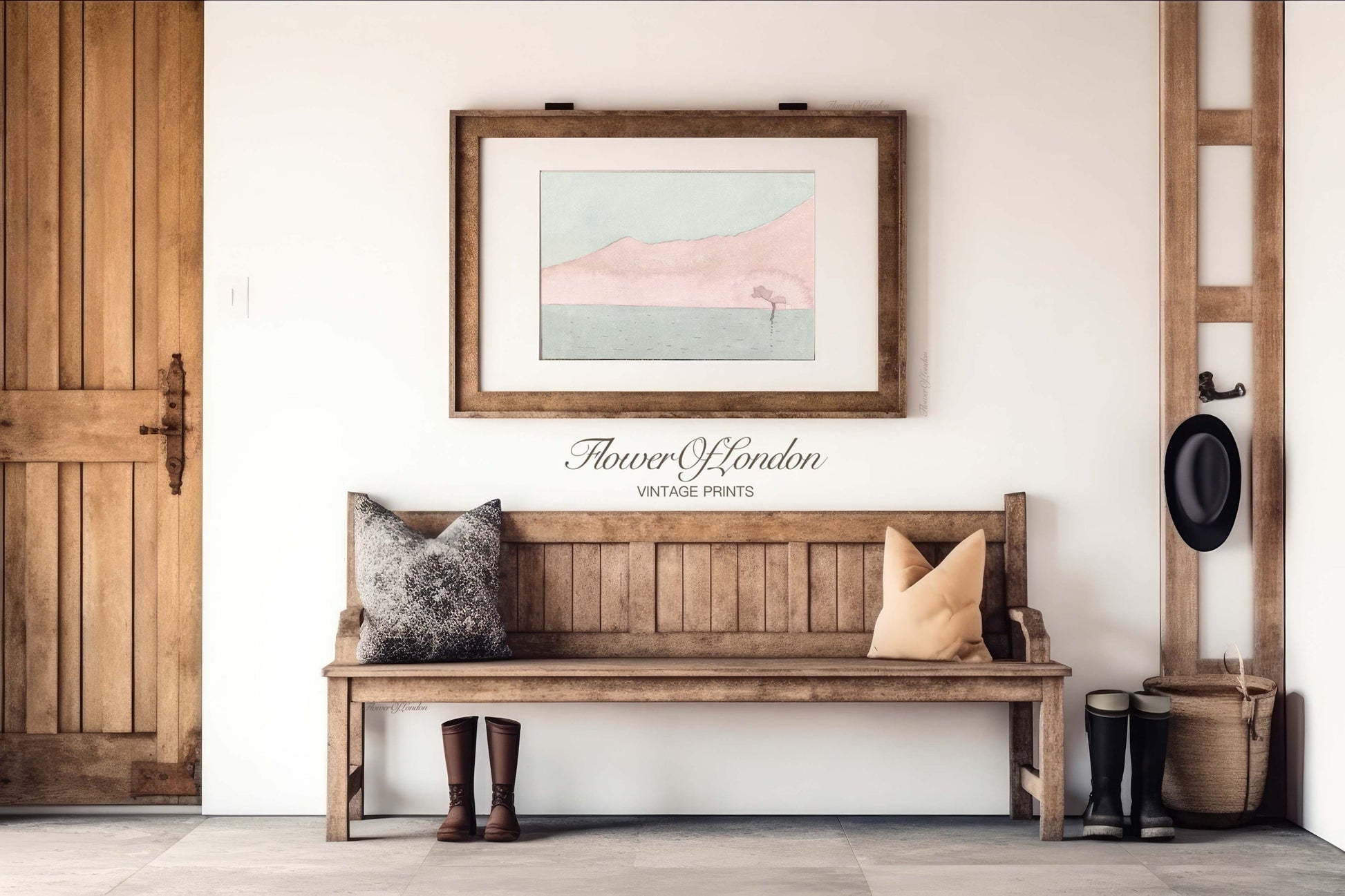 a wooden bench sitting under a framed picture