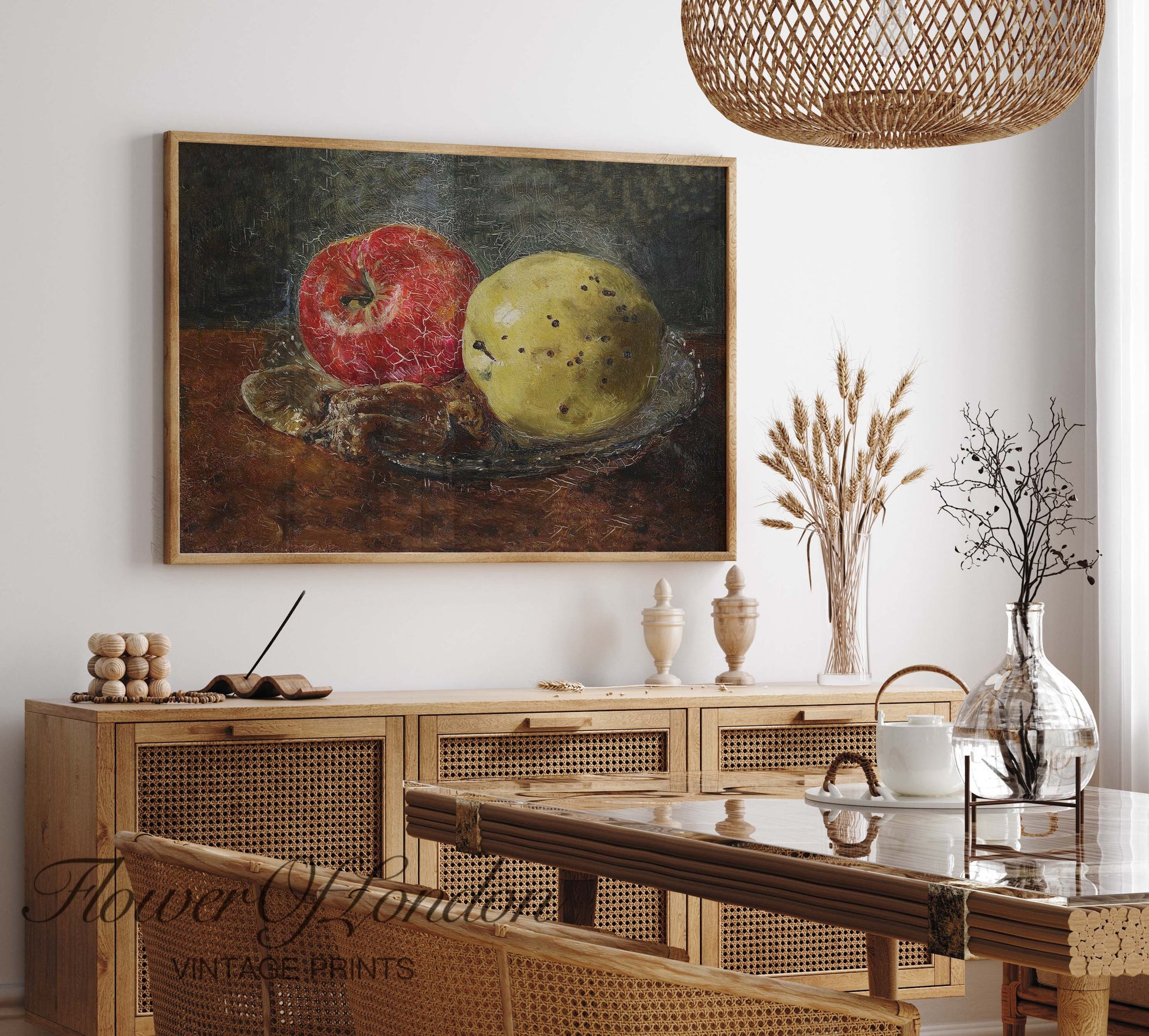 a painting of two apples on a plate on a table