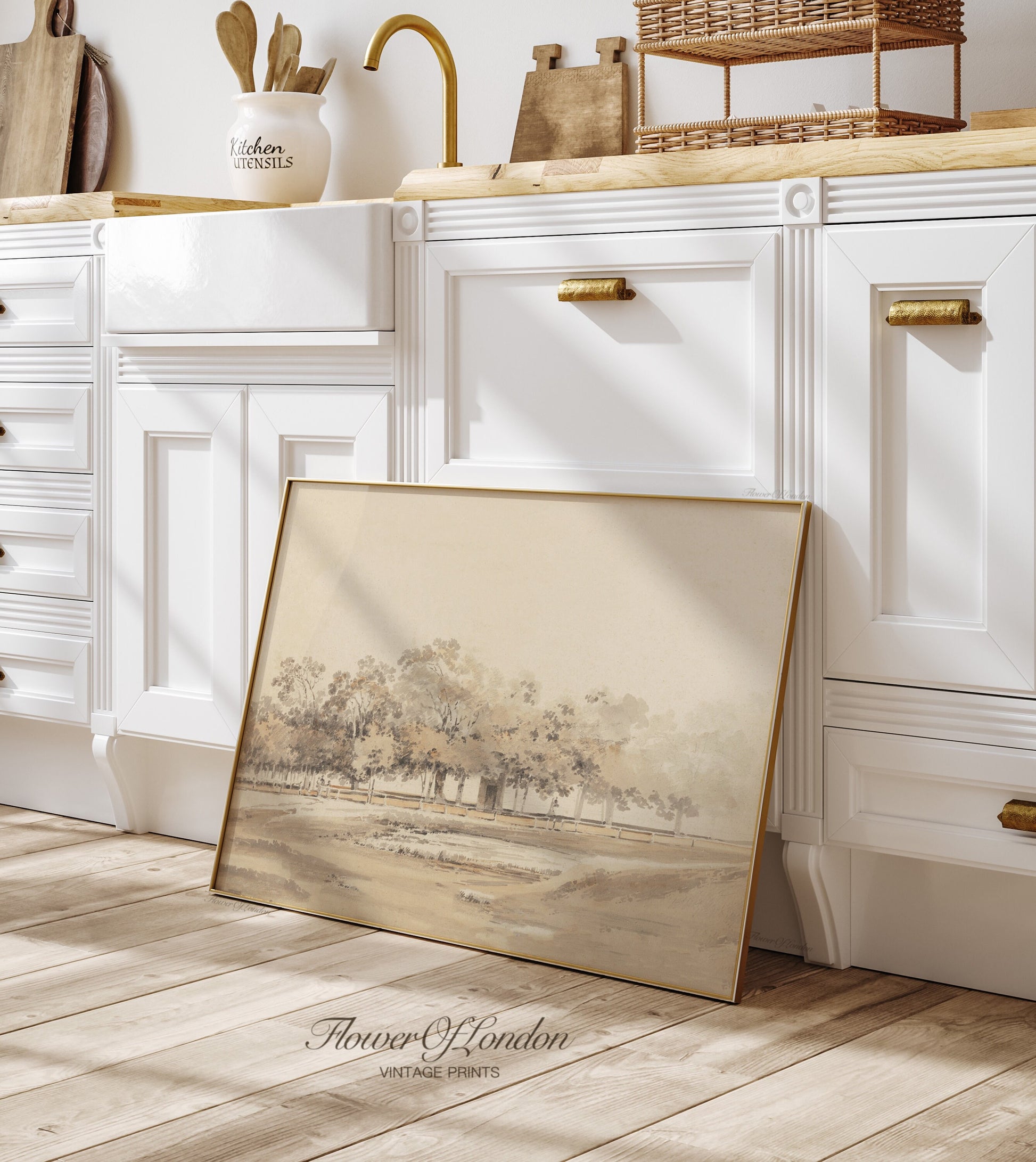 a picture frame sitting on the floor in a kitchen