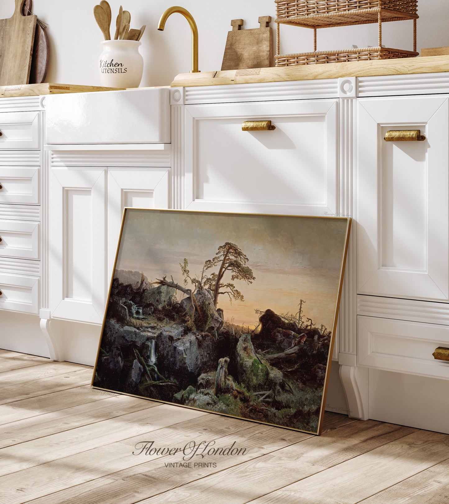 a painting of a landscape on a kitchen counter