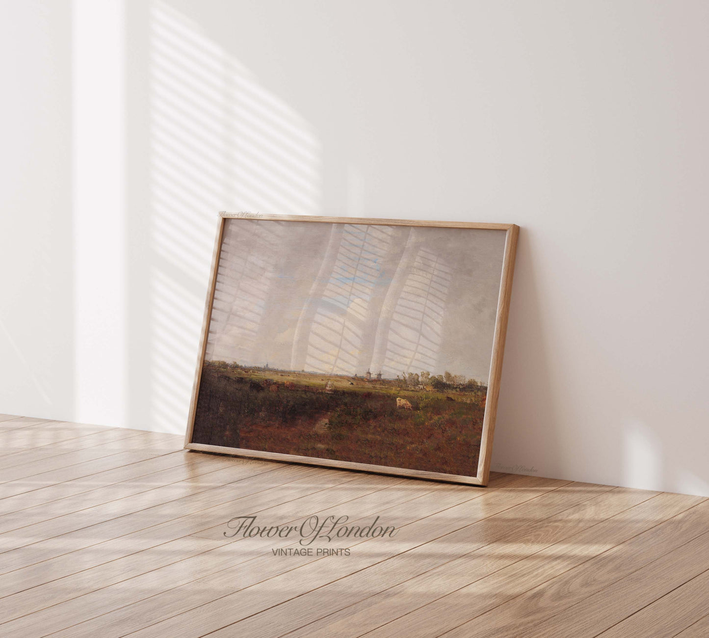 a picture frame sitting on top of a hard wood floor