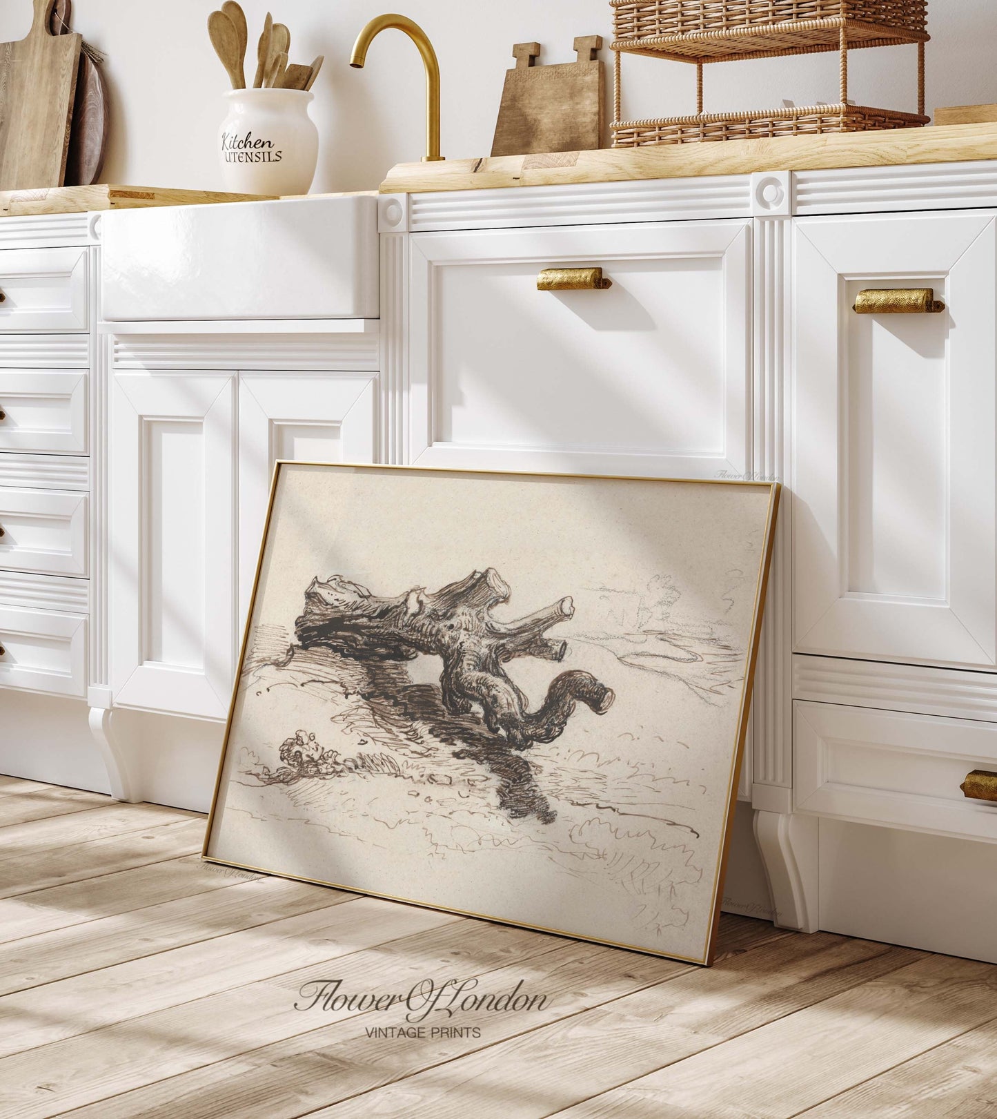 a picture frame sitting on the floor in a kitchen