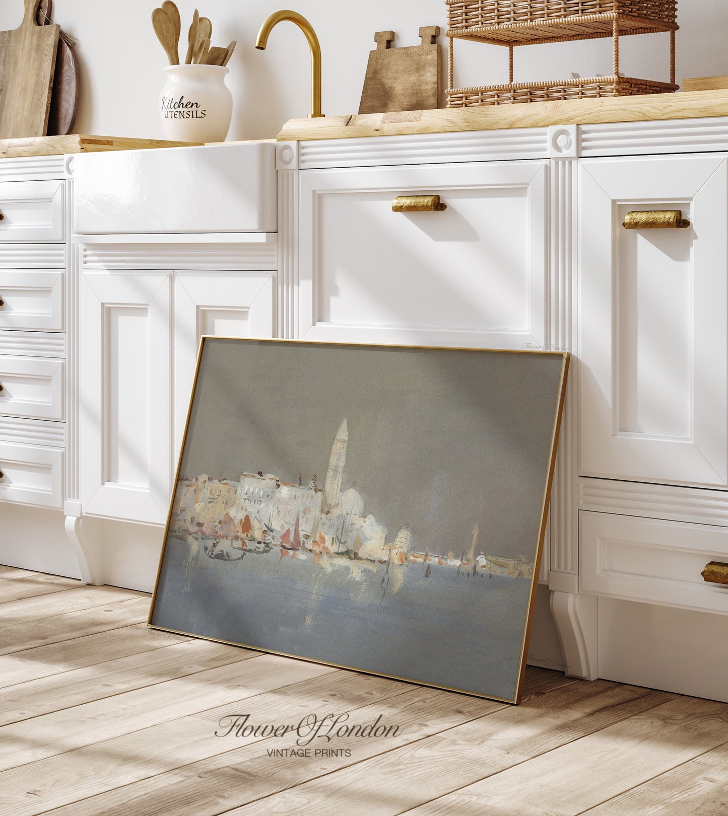 a picture frame sitting on the floor in a kitchen