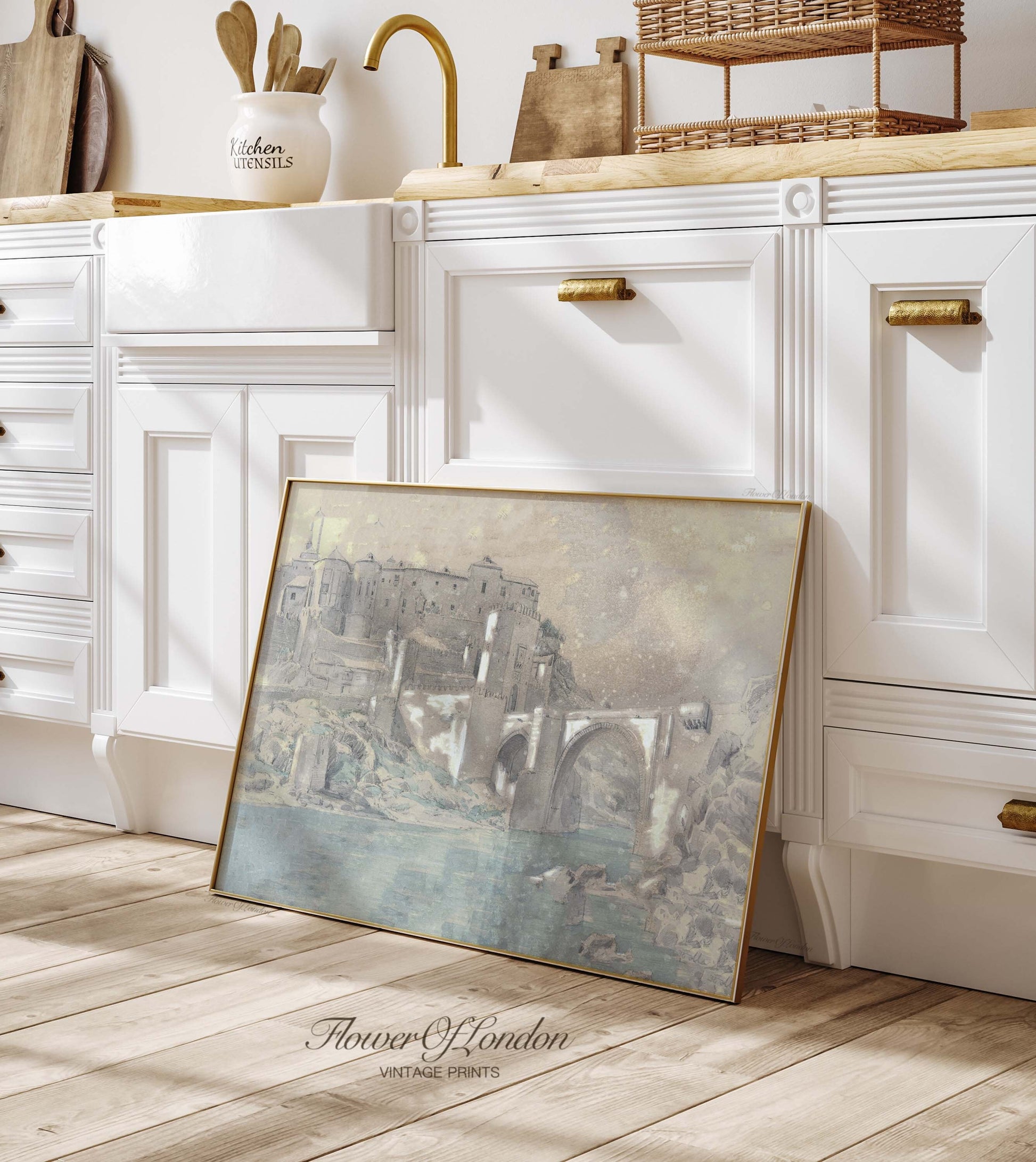 a picture frame sitting on the floor in a kitchen