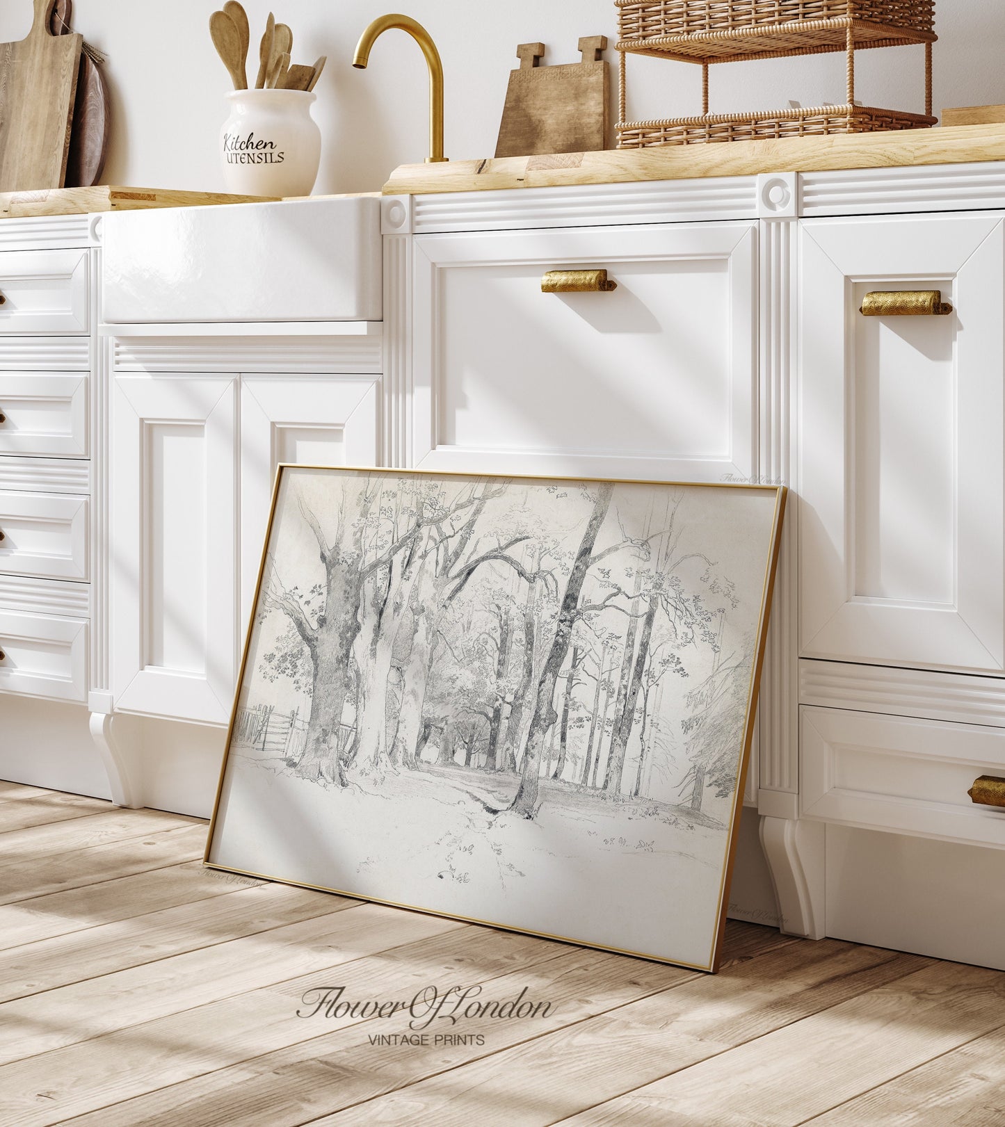 a picture frame sitting on the floor in a kitchen